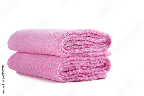 Pink towel isolated on a white background