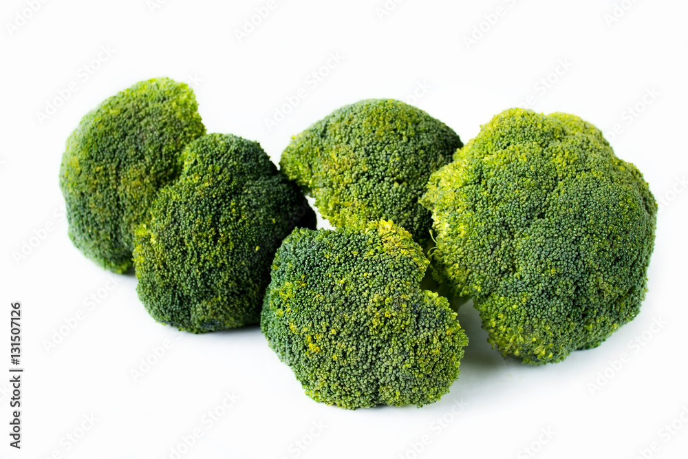 Broccoli in a pile isolated on white background. Broccoli in a pile isolated on white background.