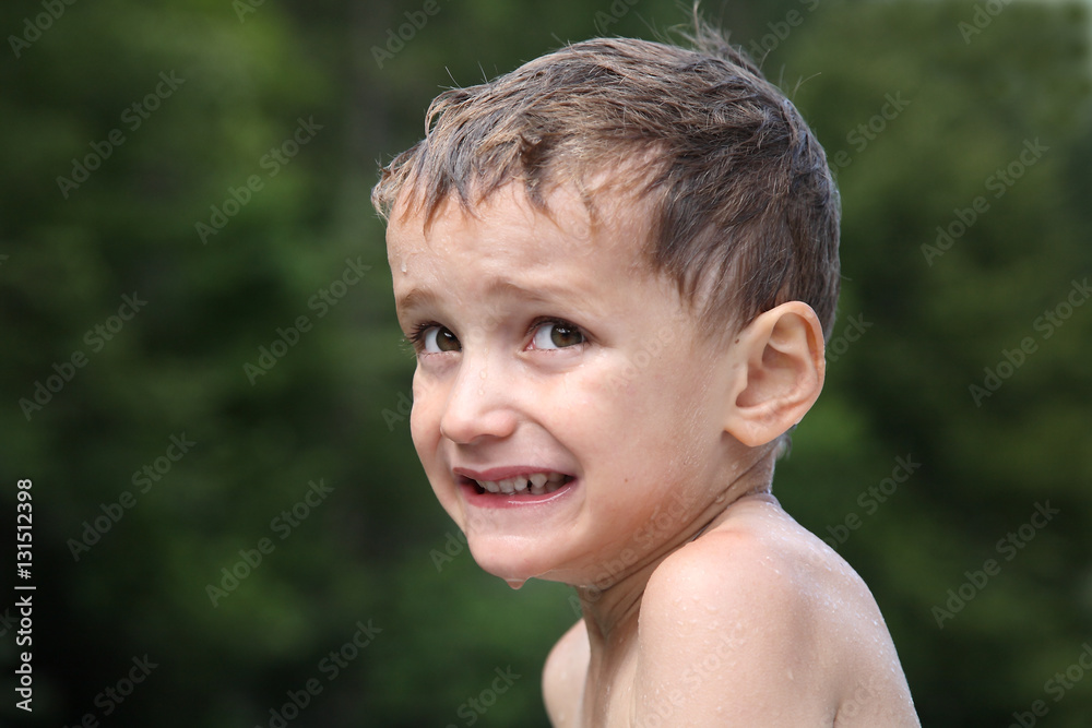 Portrait of a european looking boy with wet face Portrait of a european looking boy with wet face