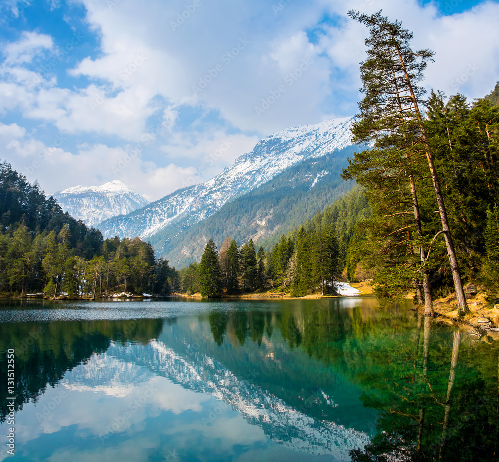 Fantastic views of the tranquil lake with amazing reflection. Austria