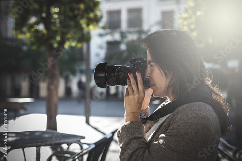 Beautiful Female photographer shooting