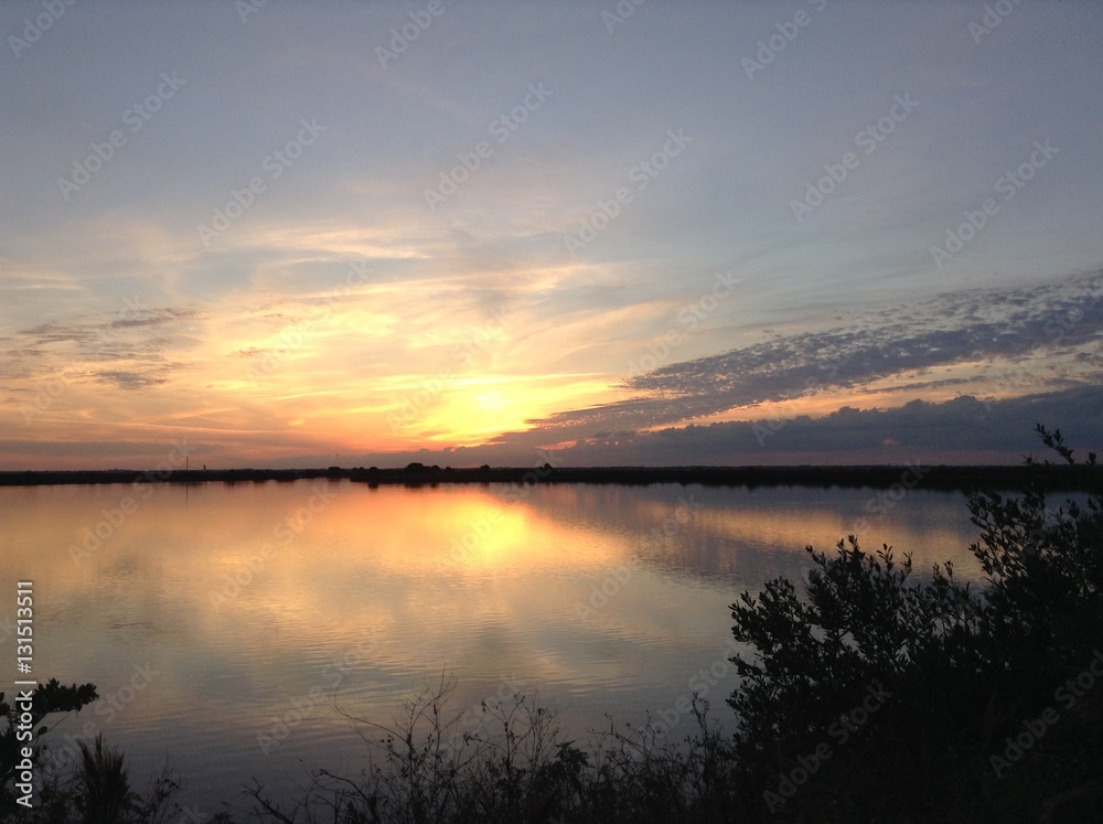 Sunset over salt marsh Cape Canaveral, FL