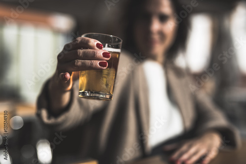 40 year old woman drinking beer