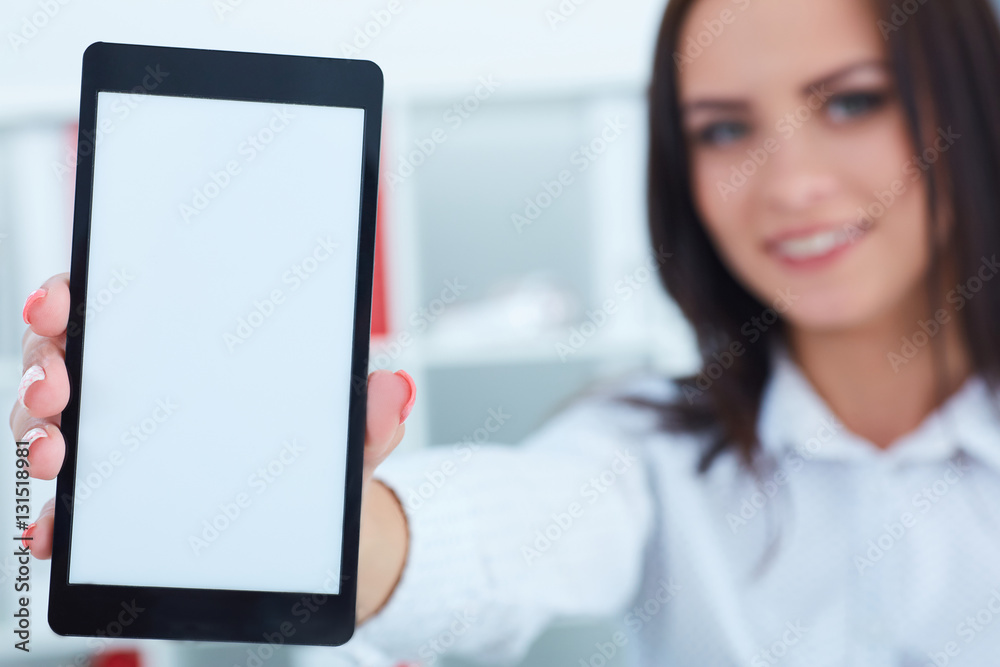 Businesswoman showing a blank smartphone screen. Focus on smartphone. Businesswoman showing a blank smartphone screen. Focus on smartphone.