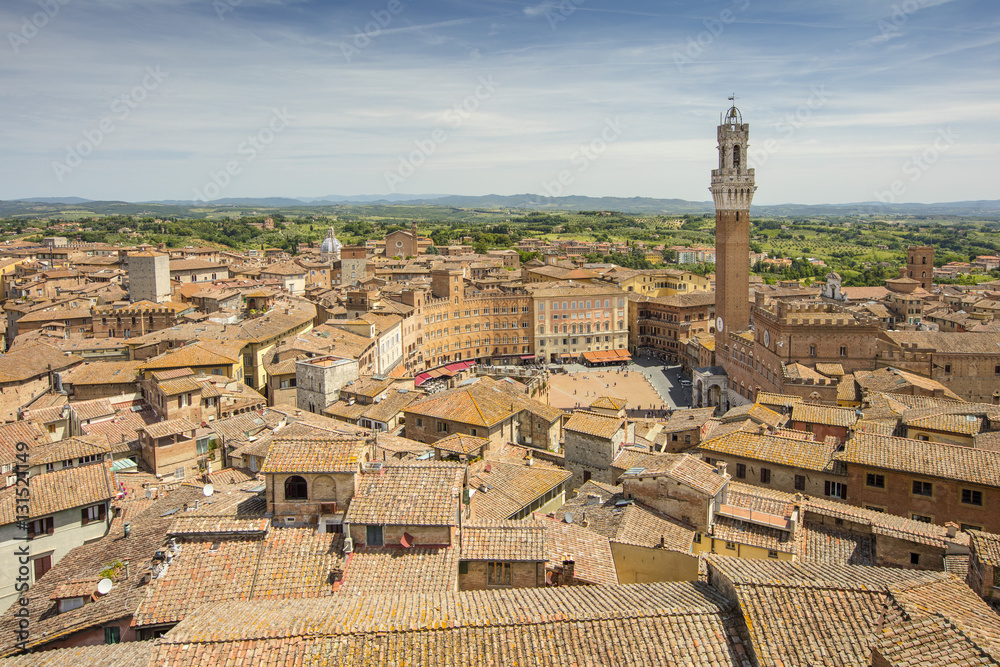 red roofs and old big towers in Tuscany city