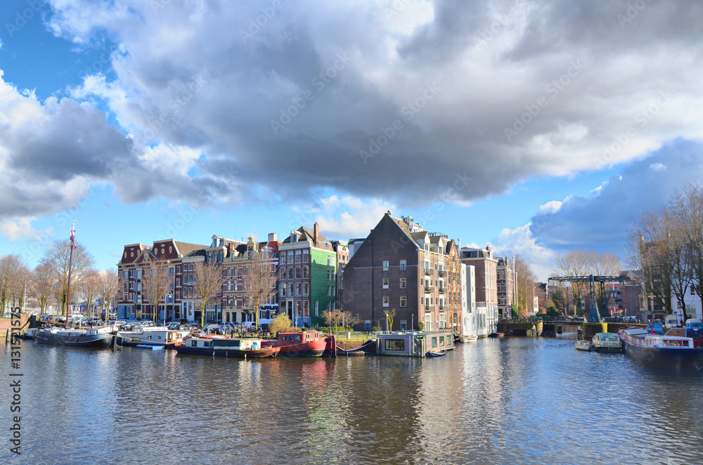 View of Amsterdam with houses built on  canals 
