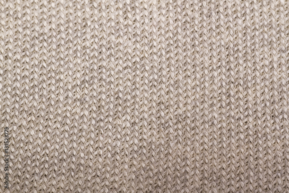 beige knitted fabric textured background