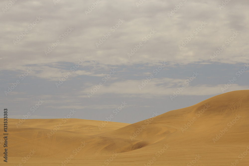 view from the road to the African dunes in the desert near the o