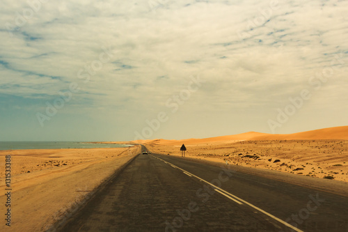 view from the road to the African dunes in the desert near the o