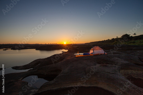 camping tent in sunrise © ballhina