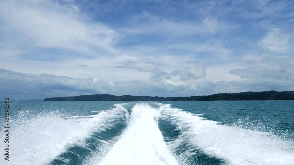 Fast sailing with speed boat ride on the sea on a sunny day
Fast sailing with speed boat ride on the sea on a sunny day