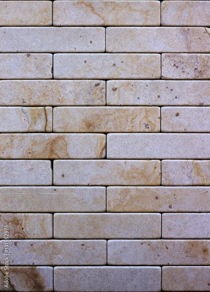 Wall of Indian sandstone, with a beautiful structure, decorative building, facing material Wall of Indian sandstone, with a beautiful structure, decorative building, facing material