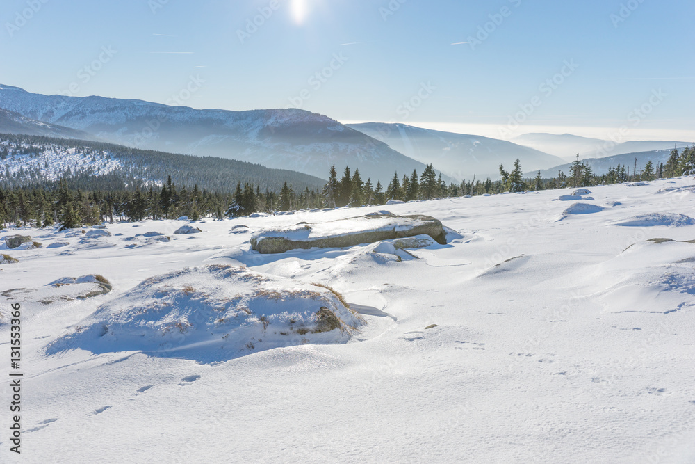 Sun shining over snow covered Giant mountains, Czech Republic Sun shining over snow covered Giant mountains, Czech Republic