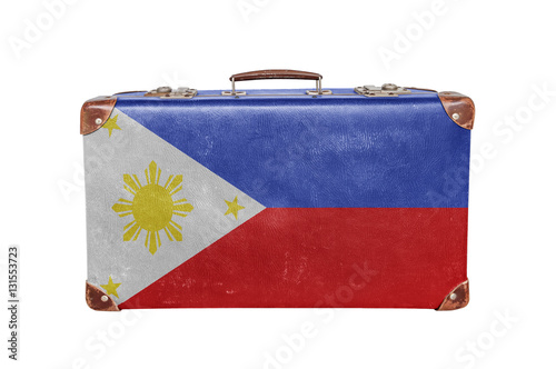 Vintage suitcase with Philippines flag photo