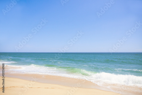 The coast of blue ocean and sand beach