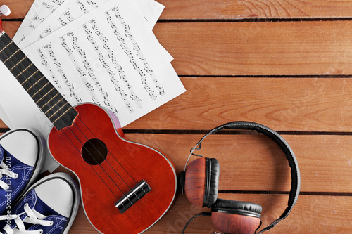 Small guitar, headphones, m...