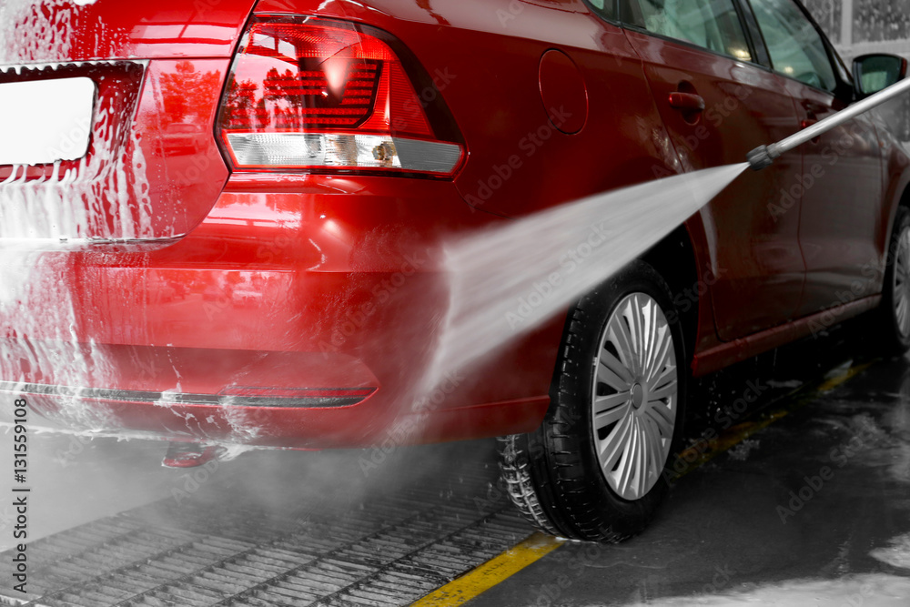 Car in car wash station StockFoto Adobe Stock