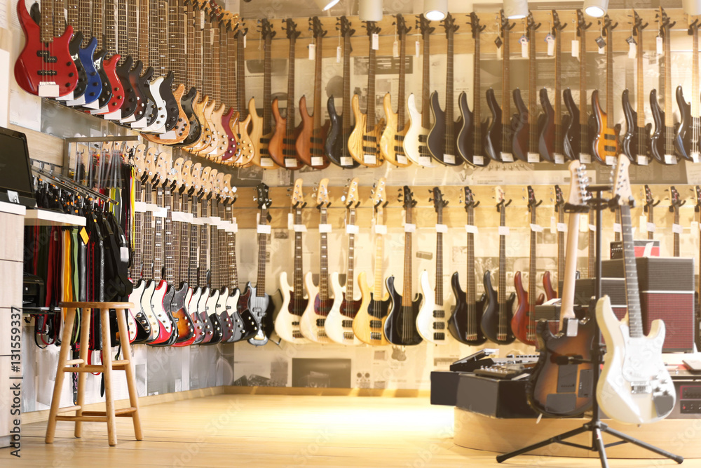 Naklejka premium Guitars in music shop