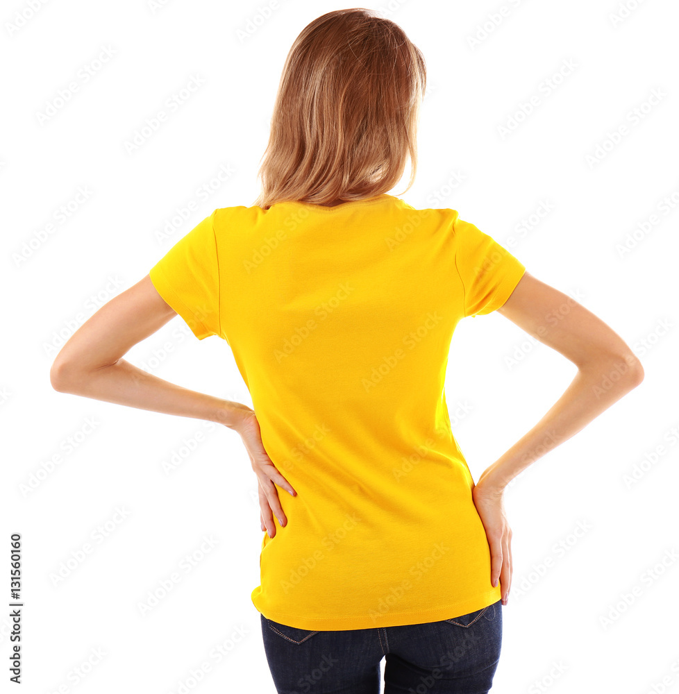 Young woman in blank yellow t-shirt on white background Young woman in blank yellow t-shirt on white background