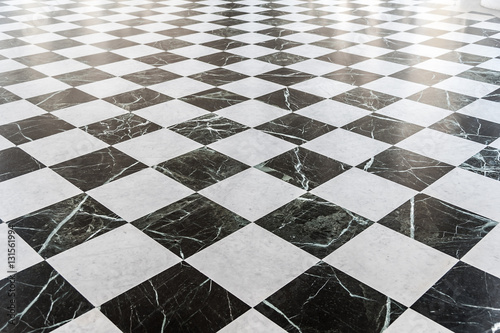 Photographie Black and white checkered marble floor