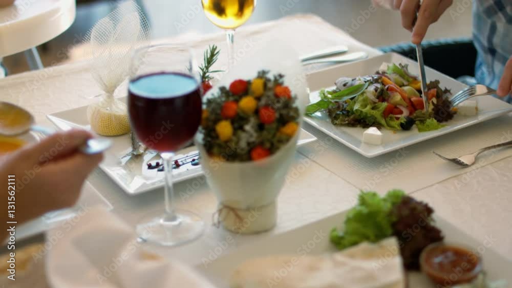 Appetizing and tasty meal of the friendly family in the cafe