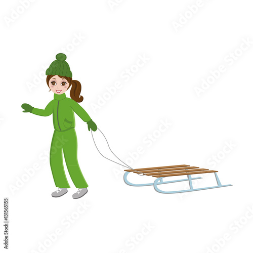 teen brunette girl plays and skates with sled
