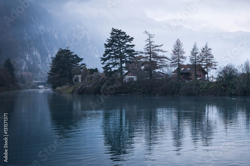 Foggy lake atmosphere in Interlaken , Switzerland on 30 November 2016 photo