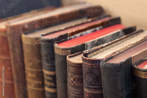 Old books on a shelf.