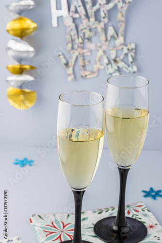 Glasses with sparkling wine for New Year party.