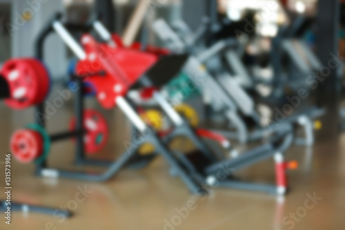 Gym interior with equipment, blurred background © Africa Studio