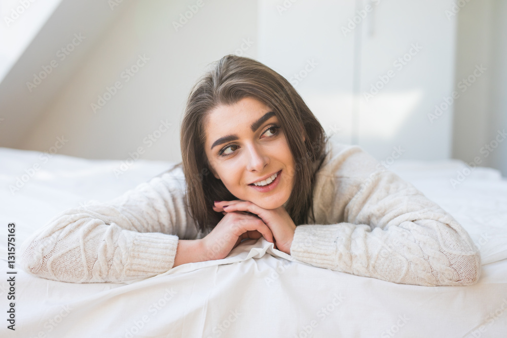 Nice pretty girl smiling in bed Nice pretty girl smiling in bed