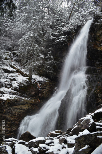 Waterfall from ravine in winter  long exposure