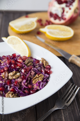 salad of red cabbage, pomegranate, apple and walnuts