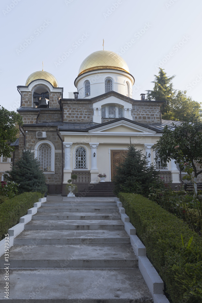 Fototapeta premium Temple Transfiguration in Hosta district of Sochi city at sunrise, Krasnodar region, Russia