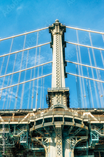 Brooklyn Bridge in New York City at sunset. Vivid splittoned image.  

 photo