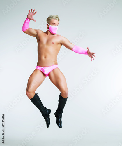 striptease dancer wearing pink photo