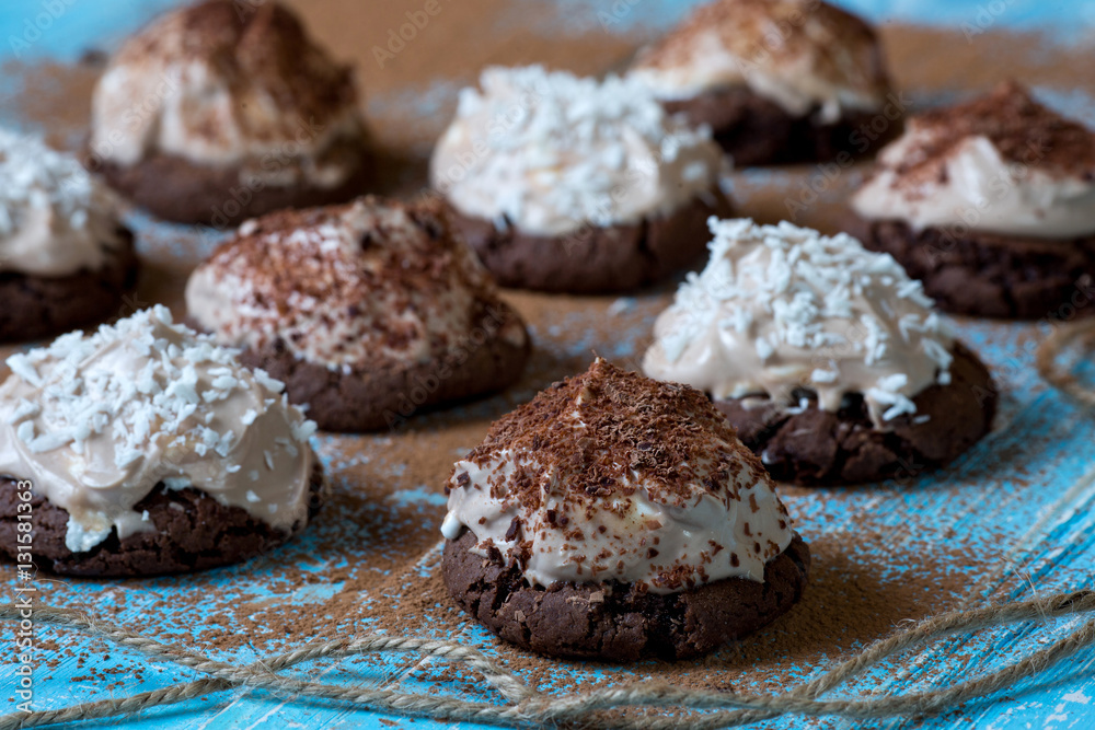 Homemade chocolate cakes on a blue wooden background Homemade chocolate cakes on a blue wooden background