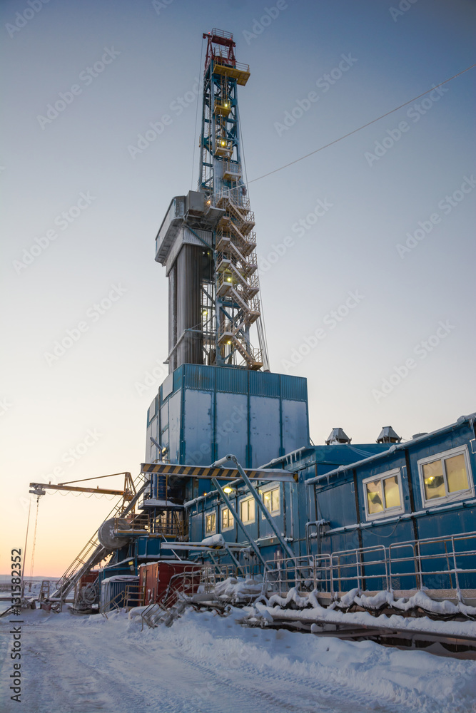 In the northern oil and gas field. Drilling rig. Before her lay the drill pipes. In the northern oil and gas field. Drilling rig. Before her lay the drill pipes.