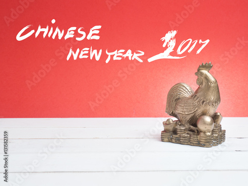 Chinese new year festival decorations, Flat lay chinese new year red paper art and craft paper. Brush drawing wording for  Chinese New year. © anon