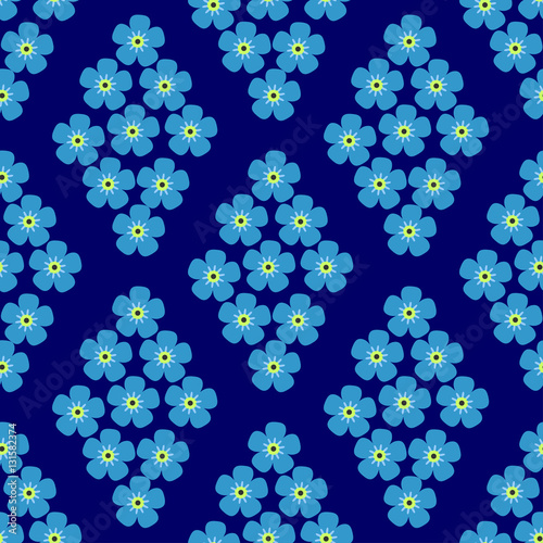 seamless pattern with forget-me-in the form of rhombus on dark blue background