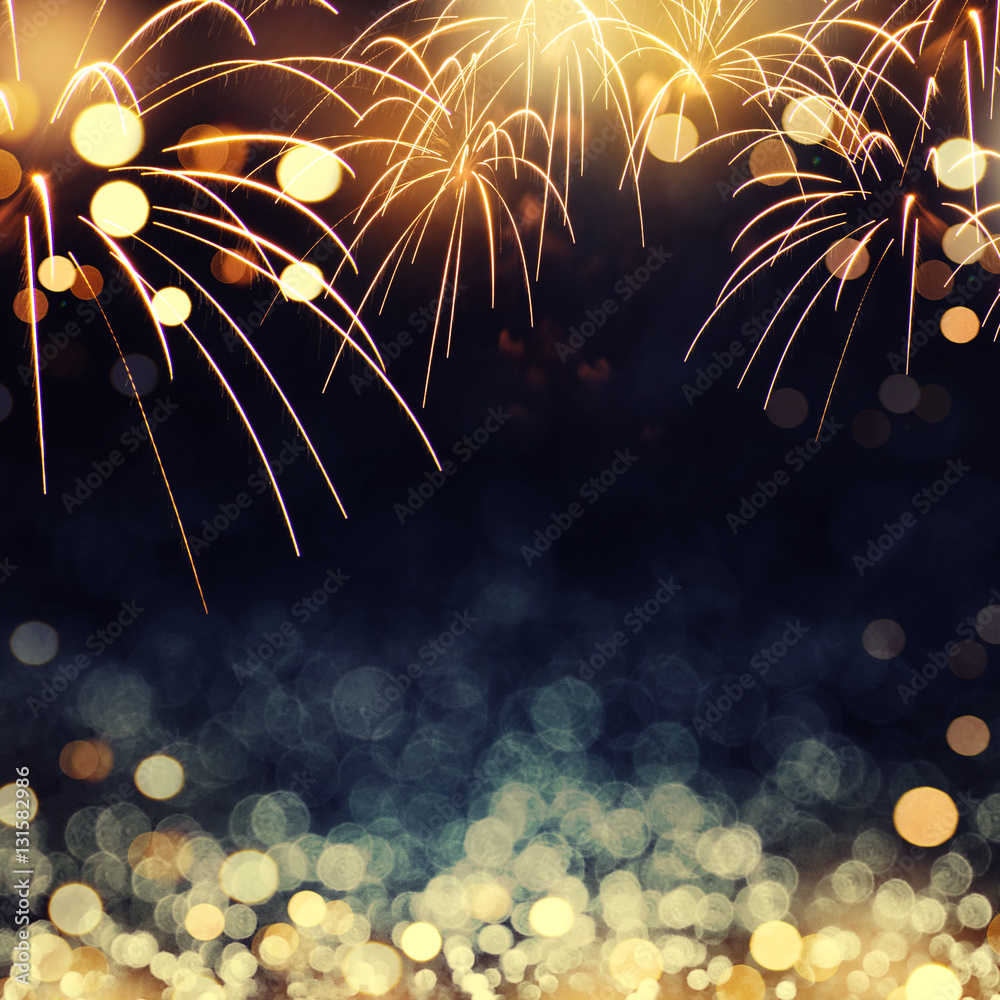 Gold and dark blue Fireworks and bokeh in New Year eve and copy space.  Abstract background holiday. Stock Photo | Adobe Stock