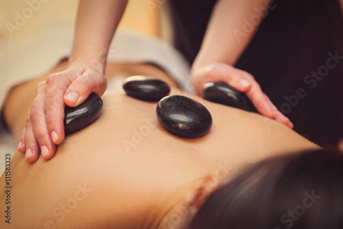 Masseuse undergoing massage of human body