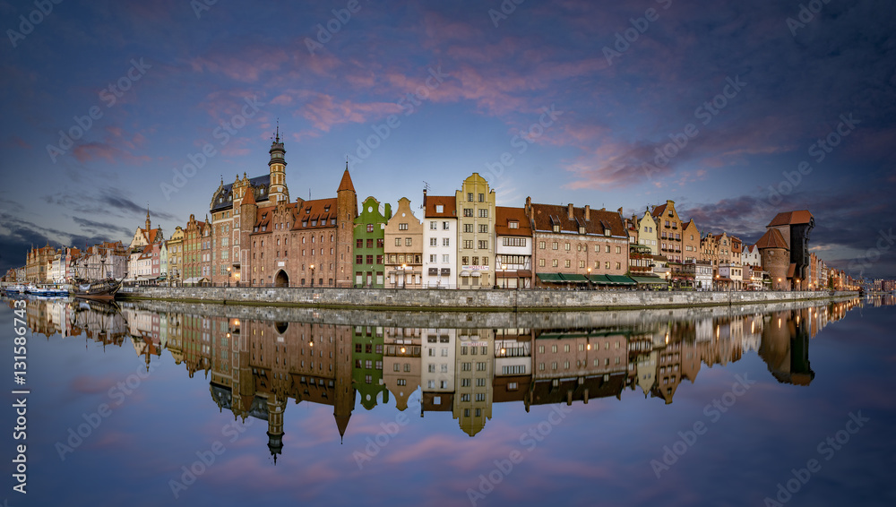 Colourful historic houses near Motlawa river in port of Gdansk