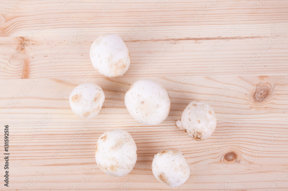 Fresh mushrooms on wood table