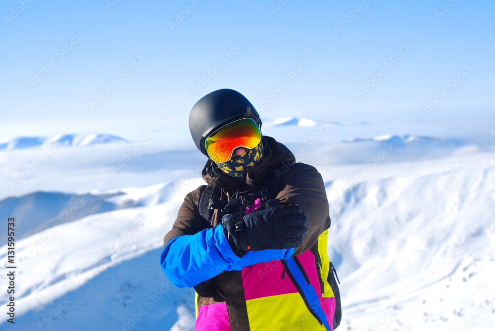 snowboarder standing on the top of the mountain