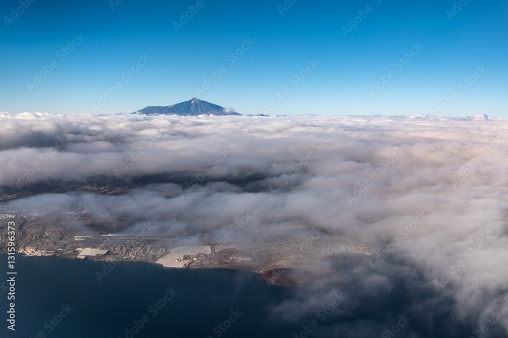  mountain above clouds - island aerial