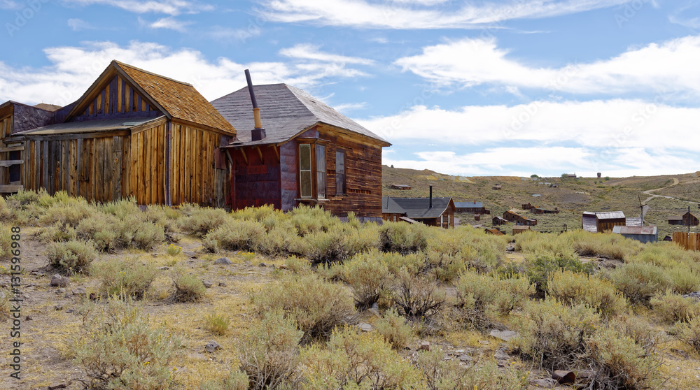 Abandoned dwellings in the 19th Century gold mining ghost town of Bodie, California, a State Historic Park