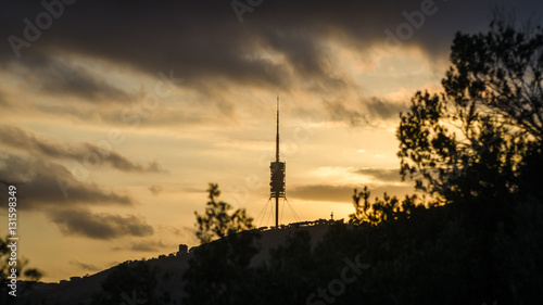 Yellow sunset light and tower in Barcelona, Spain
