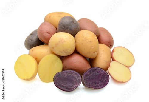Mixed varieties of potatoes: red potatoes, yellow potatoes and purple potatoes