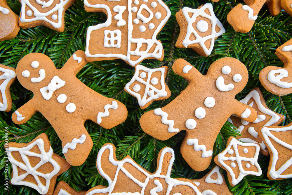Various types of homemade gingerbread on a Christmas tree branch